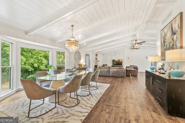 980 Casteel Rd, Powder Springs, GA 30127 - dining area with wood finished floors, healthy amount of natural light, a chandelier, and a ceiling fan