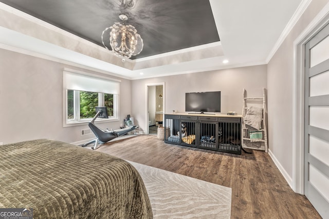 980 Casteel Rd, Powder Springs, GA 30127 - bedroom featuring ornamental molding, wood finished floors, a chandelier, a raised ceiling, and recessed lighting