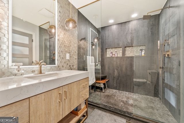 980 Casteel Rd, Powder Springs, GA 30127 - full bathroom with vanity, walk in shower, and decorative backsplash