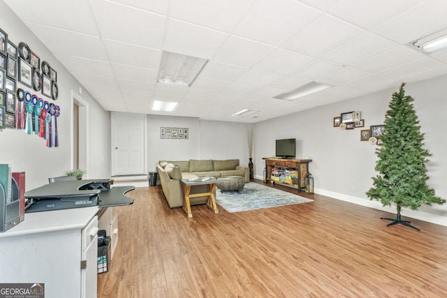 980 Casteel Rd, Powder Springs, GA 30127 - living room featuring a drop ceiling and light wood finished floors