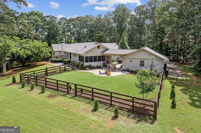 980 Casteel Rd, Powder Springs, GA 30127 - rear view of house featuring a patio area, a fenced backyard, and a sunroom