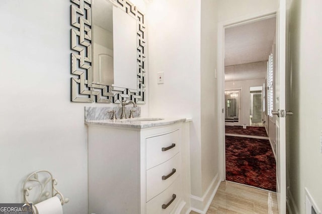 2983 Peek Rd NW, Atlanta, GA 30318 - bathroom with vanity and baseboards