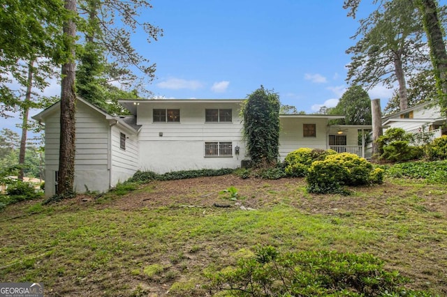 2983 Peek Rd NW, Atlanta, GA 30318 - rear view of property with a lawn