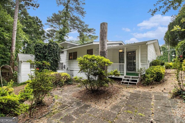 2983 Peek Rd NW, Atlanta, GA 30318 - rear view of property with a porch