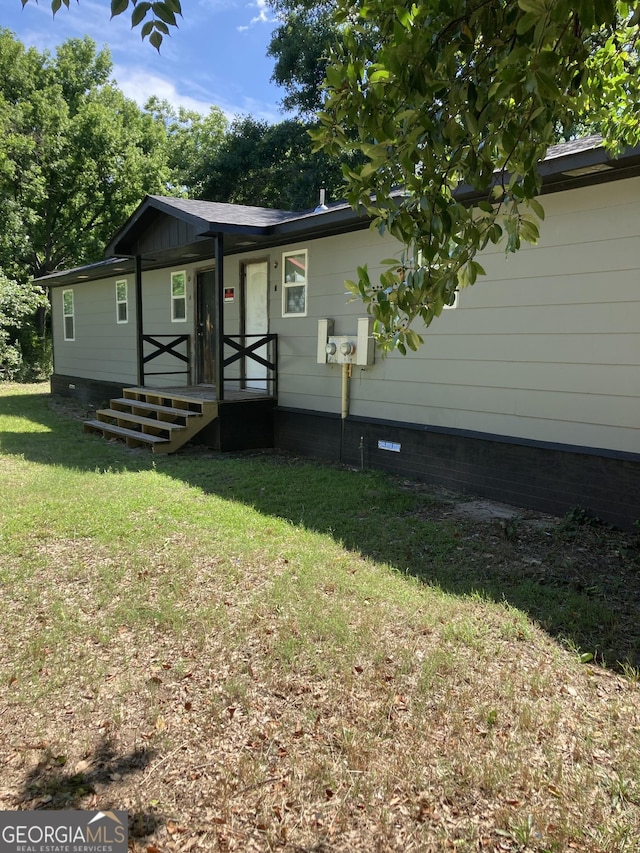 2960 Churchill St, Macon, GA 31204 - view of front of home featuring a front yard, covered porch, and crawl space