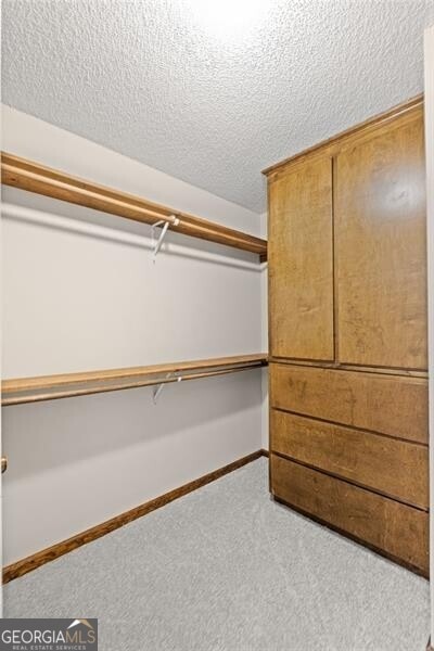 1279 Colony Pl, Marietta, GA 30068 - walk in closet featuring carpet floors