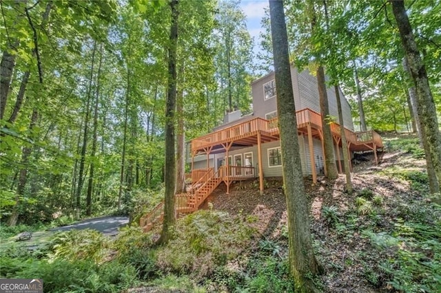 1279 Colony Pl, Marietta, GA 30068 - rear view of property with a wooden deck and stairway