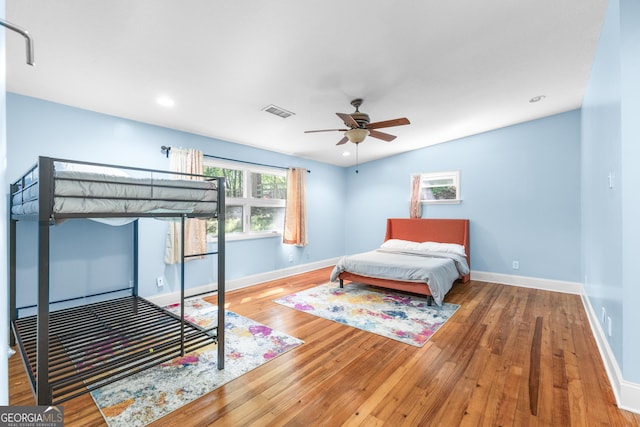 6567 Tahiti Way, Flowery Branch, GA 30542 - bedroom featuring hardwood / wood-style flooring, ceiling fan, and recessed lighting