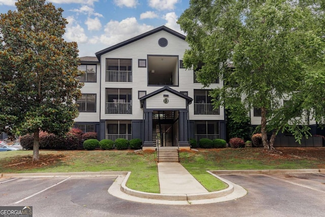 211 N Ave Unit 1317, Athens, GA 30601 - view of property with uncovered parking and stairway