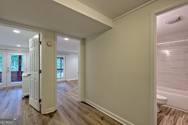 33 Berkshire Ln, Dillard, GA 30537 - hallway featuring wood finished floors, french doors, and recessed lighting