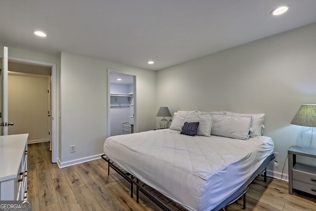 33 Berkshire Ln, Dillard, GA 30537 - bedroom featuring light wood-style flooring, recessed lighting, and a spacious closet