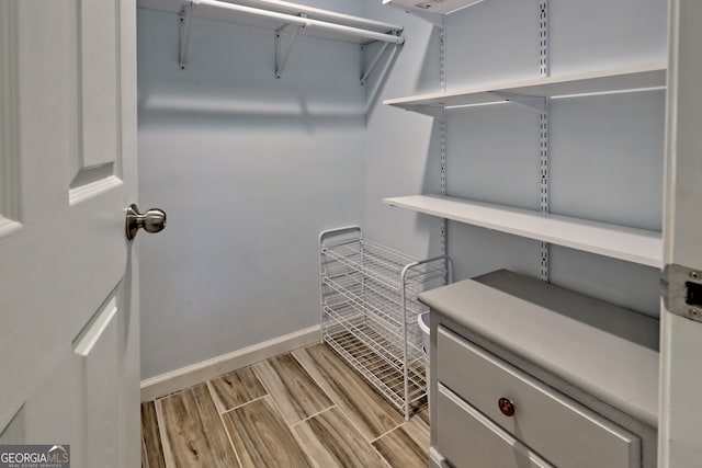 33 Berkshire Ln, Dillard, GA 30537 - spacious closet with light wood-style flooring