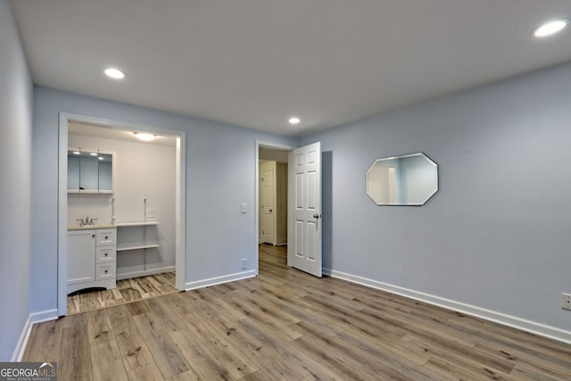33 Berkshire Ln, Dillard, GA 30537 - unfurnished bedroom featuring wood finished floors and recessed lighting