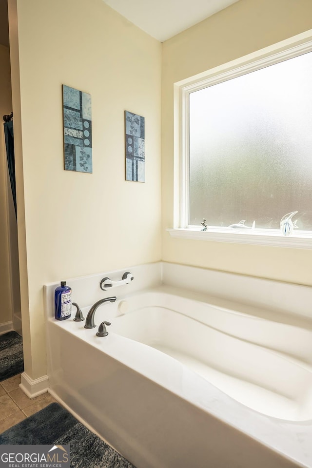 126 Savannah Way, Milner, GA 30257 - full bathroom featuring a bath and tile patterned flooring