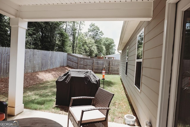 126 Savannah Way, Milner, GA 30257 - fenced backyard featuring a grill and a patio area