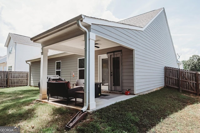 126 Savannah Way, Milner, GA 30257 - rear view of property featuring a fenced backyard, a patio, ceiling fan, and roof with shingles