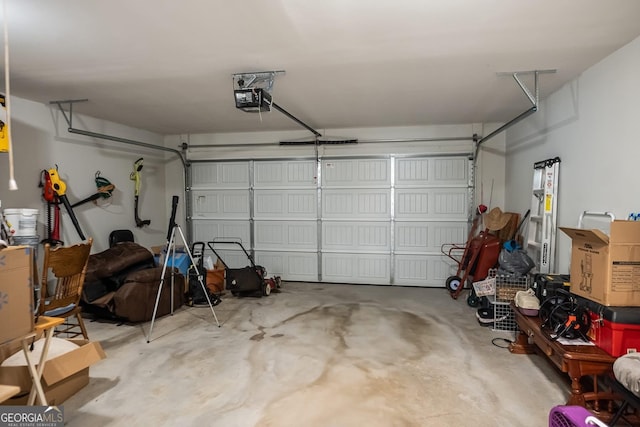 126 Savannah Way, Milner, GA 30257 - garage with a garage door opener
