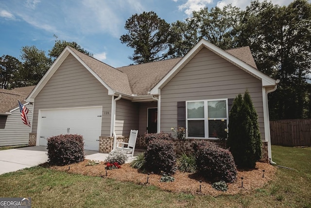 126 Savannah Way, Milner, GA 30257 - single story home featuring an attached garage, concrete driveway, a shingled roof, and stone siding
