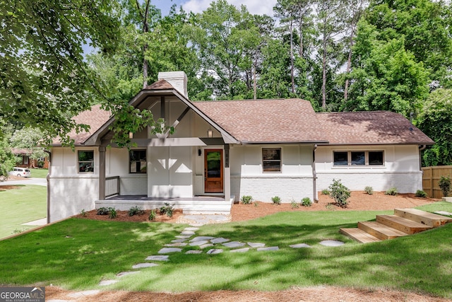 685 Pinecrest Dr, Athens, GA 30605 - view of front of home with a chimney, brick siding, a porch, and a front yard