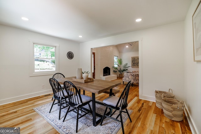 685 Pinecrest Dr, Athens, GA 30605 - dining room featuring healthy amount of natural light, recessed lighting, light wood-style flooring, and a fireplace