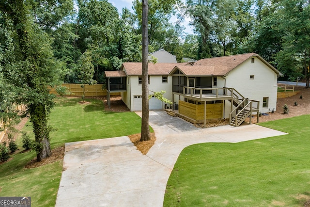 685 Pinecrest Dr, Athens, GA 30605 - back of house with stairs, driveway, a garage, roof with shingles, and view of wooded area