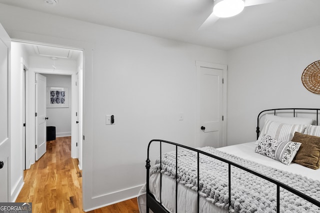 685 Pinecrest Dr, Athens, GA 30605 - bedroom with attic access, light wood-style flooring, and ceiling fan