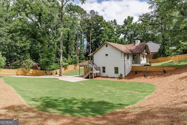 685 Pinecrest Dr, Athens, GA 30605 - rear view of property featuring stairs, a chimney, a fenced backyard, and a deck