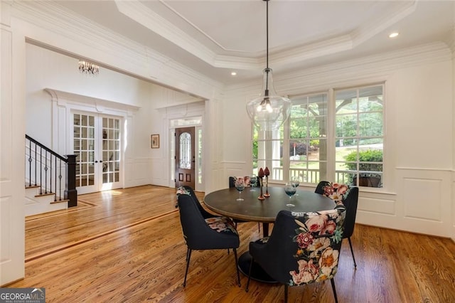 930 Shepards Ct, Roswell, GA 30075 - dining area featuring a decorative wall, french doors, crown molding, wood finished floors, and stairway