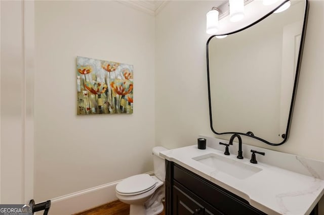 930 Shepards Ct, Roswell, GA 30075 - half bathroom with vanity, wood finished floors, and ornamental molding