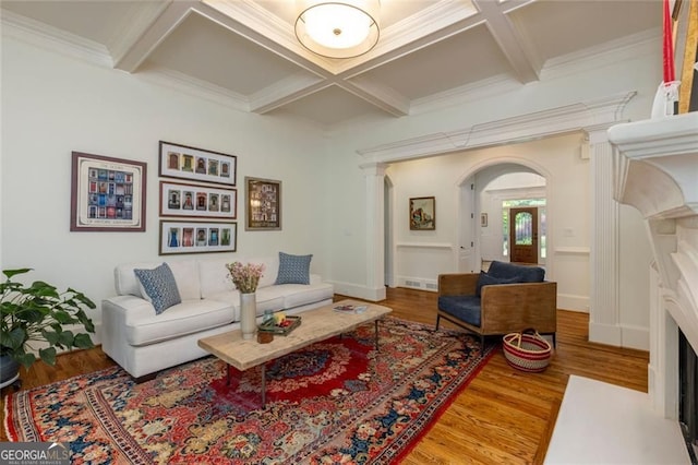 930 Shepards Ct, Roswell, GA 30075 - living room with coffered ceiling, wood finished floors, arched walkways, crown molding, and beamed ceiling