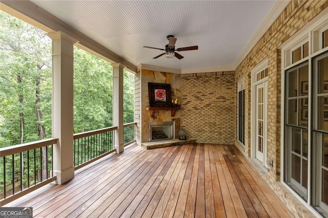 930 Shepards Ct, Roswell, GA 30075 - deck featuring a ceiling fan and an outdoor stone fireplace