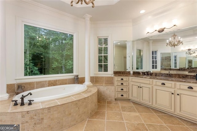 930 Shepards Ct, Roswell, GA 30075 - bathroom featuring a chandelier, a garden tub, vanity, ornamental molding, and decorative columns