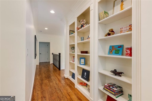 930 Shepards Ct, Roswell, GA 30075 - hall with crown molding, wood finished floors, an upstairs landing, recessed lighting, and built in shelves