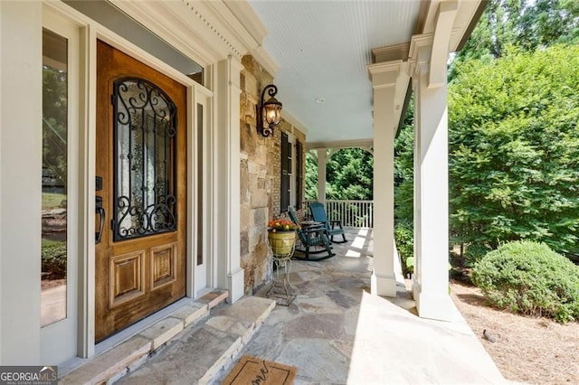 930 Shepards Ct, Roswell, GA 30075 - view of exterior entry with a porch and stone siding
