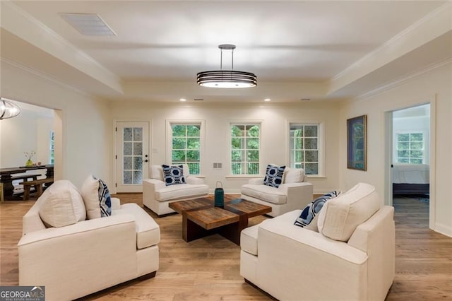 930 Shepards Ct, Roswell, GA 30075 - living room featuring a raised ceiling, light wood-style flooring, ornamental molding, and recessed lighting