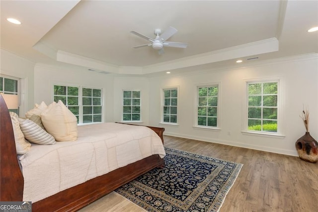 930 Shepards Ct, Roswell, GA 30075 - bedroom featuring a tray ceiling, crown molding, wood finished floors, recessed lighting, and a ceiling fan