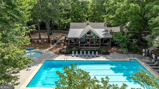 930 Shepards Ct, Roswell, GA 30075 - community pool featuring a patio area