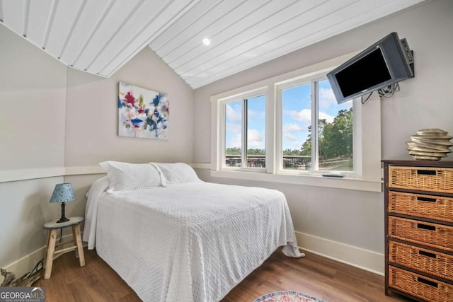 451 Wilderness Camp Rd, White, GA 30184 - bedroom featuring vaulted ceiling and wood finished floors