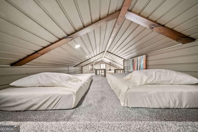 451 Wilderness Camp Rd, White, GA 30184 - bedroom with lofted ceiling, carpet flooring, and wooden walls