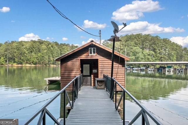 451 Wilderness Camp Rd, White, GA 30184 - dock area featuring a wooded view and a water view