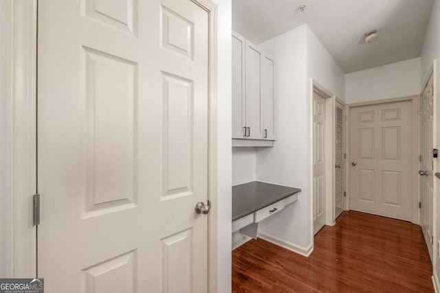 400 17th St NW Unit 2308, Atlanta, GA 30363 - hall with dark wood finished floors and baseboards