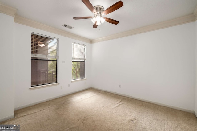 400 17th St NW Unit 2308, Atlanta, GA 30363 - spare room featuring ornamental molding, carpet, and ceiling fan