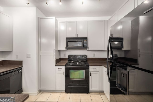 400 17th St NW Unit 2308, Atlanta, GA 30363 - kitchen with black appliances, dark countertops, and light tile patterned flooring