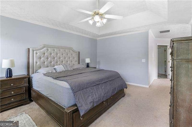 3589 Garden Manor Dr, Loganville, GA 30052 - bedroom featuring light colored carpet, a tray ceiling, ceiling fan, and crown molding