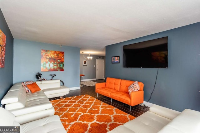 375 Ralph Mcgill Blvd NE Unit 1701, Atlanta, GA 30312 - living room featuring wood finished floors and a chandelier