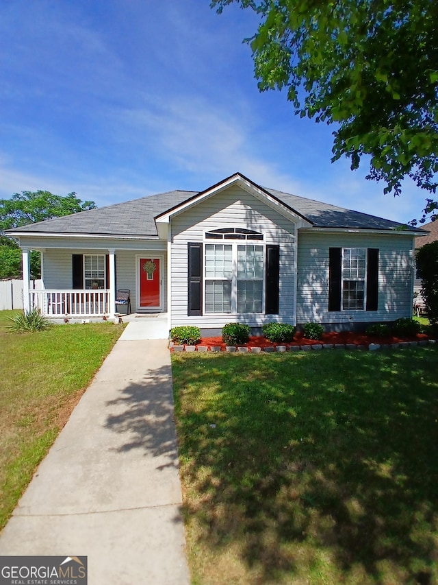 606 Haverhill Cir, Warner Robins, GA 31088 - single story home with covered porch and a front yard
