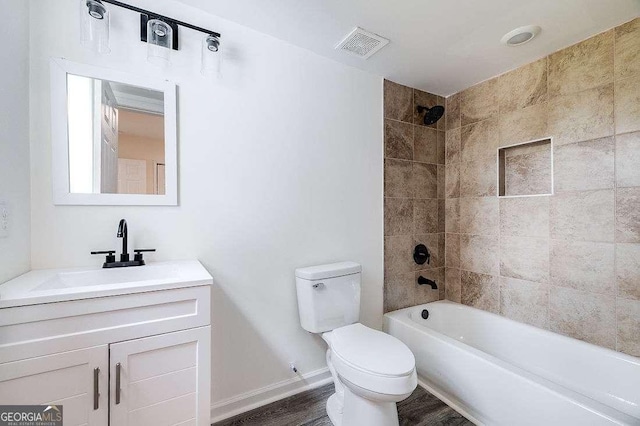 5215 Cordell St, Savannah, GA 31405 - bathroom with vanity, shower / washtub combination, and wood finished floors