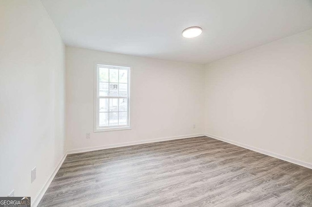 5215 Cordell St, Savannah, GA 31405 - unfurnished room with wood finished floors and baseboards