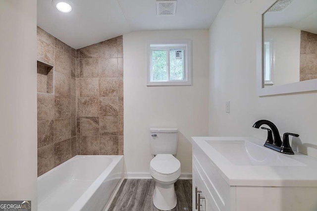 5215 Cordell St, Savannah, GA 31405 - bathroom featuring vanity, bathing tub / shower combination, and wood finished floors