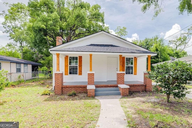 5215 Cordell St, Savannah, GA 31405 - bungalow-style house featuring a porch and roof with shingles